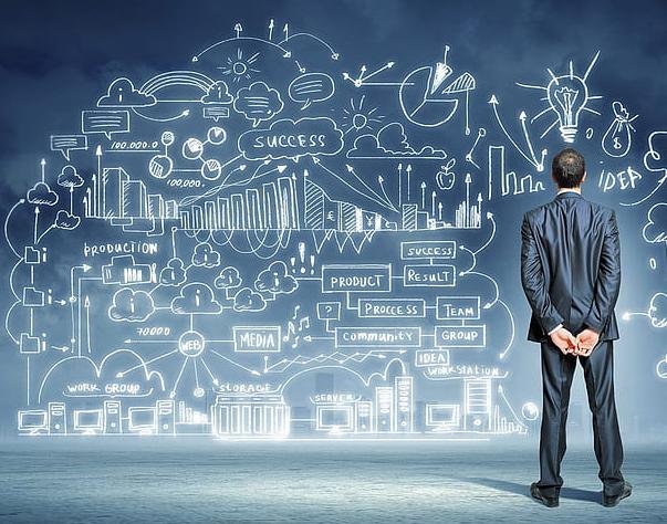 Professional IT architect reviewing technology systems and providing strategic clarity for business growth